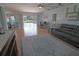 Inviting living room with pool views, and a work space to the side at 5131 Appomattox Dr, North Port, FL 34287