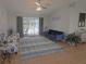 Relaxing living room with stylish decor, and access to the pool area at 5131 Appomattox Dr, North Port, FL 34287