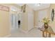 Inviting entryway leading to the living area, bathroom, and office at 8230 Agate St, Port Charlotte, FL 33981
