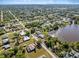 Aerial view showing houses next to the lake at 1391 Abalom St, Punta Gorda, FL 33980