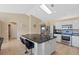Spacious kitchen with a large island, stainless steel appliances, and plenty of counter space at 1391 Abalom St, Punta Gorda, FL 33980