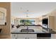 Modern island sink offers a beautiful view to the living area and expansive water views at 1391 Abalom St, Punta Gorda, FL 33980