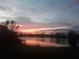 Sunset view of the lake at 1391 Abalom St, Punta Gorda, FL 33980