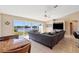 Open living space features large windows with backyard and waterfront views, and adjoins breakfast nook at 1391 Abalom St, Punta Gorda, FL 33980