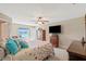 Bedroom featuring a water view, ceiling fan, and closet at 1391 Abalom St, Punta Gorda, FL 33980
