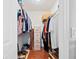 Walk-in closet with shelving for optimal storage space at 1391 Abalom St, Punta Gorda, FL 33980