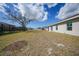 The home features a large backyard with ample room for recreation and relaxation at 149 Hercules Dr, Rotonda West, FL 33947