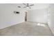 Bright bedroom featuring tile flooring, and a wall mounted bracket for a TV at 149 Hercules Dr, Rotonda West, FL 33947
