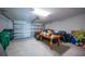 Spacious garage with an automatic door, workbench and room for parking and storage at 149 Hercules Dr, Rotonda West, FL 33947