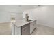 Kitchen island featuring a stainless steel dishwasher and black faucet at 149 Hercules Dr, Rotonda West, FL 33947