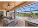 Beautiful outdoor living area featuring a pool, comfortable seating, and a scenic view at 158 Mariner Ln, Rotonda West, FL 33947