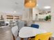 Open concept floor plan with a dining area and access to the living room and kitchen at 1909 Johannesberg Rd, North Port, FL 34288