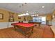 A game room that provides billiards and other games for residents' entertainment and relaxation at 24036 Buckingham Way, Port Charlotte, FL 33980