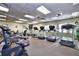 Bright gym with treadmills, bikes, and fitness equipment for residents to stay active and healthy at 24036 Buckingham Way, Port Charlotte, FL 33980