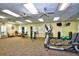 Well-equipped fitness center with modern exercise machines, free weights, and ample space at 24036 Buckingham Way, Port Charlotte, FL 33980
