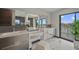 Bathroom with double sinks, vanity, and waterfront view at 36 Dolphin Dr, Treasure Island, FL 33706