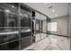 Large closet with glass cabinets and drawers, a dressing area and recessed lighting at 36 Dolphin Dr, Treasure Island, FL 33706