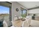 Bright dining room featuring modern decor, a stylish table, and lovely waterfront views at 36 Dolphin Dr, Treasure Island, FL 33706