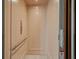 Modern elevator featuring sleek design elements and accessible features for easy transport within the home at 36 Dolphin Dr, Treasure Island, FL 33706