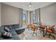 Inviting home office with comfortable seating, natural light, and contemporary decor at 36 Dolphin Dr, Treasure Island, FL 33706