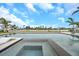 Beautiful waterfront home with a swimming pool and jacuzzi, perfect for relaxation and entertainment at 36 Dolphin Dr, Treasure Island, FL 33706