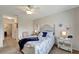 Cozy bedroom with a coastal-inspired design, including a ceiling fan and neutral tones at 3720 Pebble Ter, Punta Gorda, FL 33980