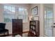 Bright office space with hardwood floors, a large window, and built-in bookshelves at 435 Manns Harbor Dr, Apollo Beach, FL 33572