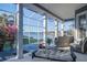Relaxing screened porch with comfortable seating and stunning water views at 435 Manns Harbor Dr, Apollo Beach, FL 33572