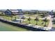 An aerial perspective of a neighborhood park's boardwalk and other amenities at 43554 Treadway Dr, Punta Gorda, FL 33982