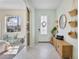 Charming entryway featuring neutral walls, tiled floors, stylish decor, and plenty of natural light at 43554 Treadway Dr, Punta Gorda, FL 33982
