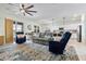 Open-concept living space with a view of the kitchen, dining area and comfortable seating for relaxation at 43554 Treadway Dr, Punta Gorda, FL 33982