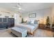 Serene main bedroom with a king bed, soft lighting, and tranquil views for restful nights at 43554 Treadway Dr, Punta Gorda, FL 33982