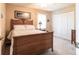 Bedroom with a bed, closet, and a nightstand with lamp at 483 Corrientes Cir, Punta Gorda, FL 33983