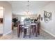 Open dining room featuring vaulted ceilings and decorative nautical elements at 483 Corrientes Cir, Punta Gorda, FL 33983