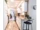 Bright kitchen featuring white cabinets, stainless steel appliances, and granite countertops at 483 Corrientes Cir, Punta Gorda, FL 33983