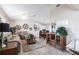 Open-concept living space, with tile flooring, comfortable seating, and nautical decor at 483 Corrientes Cir, Punta Gorda, FL 33983