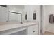 Bathroom featuring vanity area, framed mirror, modern fixtures and access to shower at 4980 Dakota Ter, North Port, FL 34286