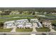 Scenic aerial view of the condo community overlooking a lush golf course and surrounding greenery at 1340 San Cristobal Ave # 304, Punta Gorda, FL 33983