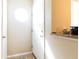 Bright entryway featuring a white door and a granite countertop at 1340 San Cristobal Ave # 304, Punta Gorda, FL 33983