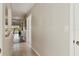 Hallway with tiled flooring, leading towards living spaces at 1340 San Cristobal Ave # 304, Punta Gorda, FL 33983