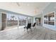 Bright and spacious sunroom with a ceiling fan and sliding windows with outdoor views at 2012 River Basin Ter, Punta Gorda, FL 33982