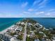 Stunning aerial view showcasing the coastal homes and condos along the Gulf Coast at 2795 N Beach Rd, Englewood, FL 34223