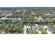 An aerial shot showcases this home's canal-front location with quick access to the Gulf of Mexico at 3487 Cabaret St, Port Charlotte, FL 33948
