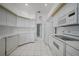 Well-lit kitchen with appliances and ample counter space at 3487 Cabaret St, Port Charlotte, FL 33948
