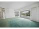 Spacious living room with sliding glass doors opening to the pool area at 3487 Cabaret St, Port Charlotte, FL 33948