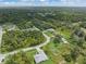 Panoramic aerial view showcasing home nestled in a lush green landscape at 5366 Dunsmuir Rd, North Port, FL 34288
