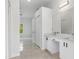 Bathroom with a double sink vanity and spacious layout, seamlessly blending style and functionality at 5366 Dunsmuir Rd, North Port, FL 34288