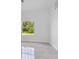 Bedroom with a large window providing natural light and a view of the outdoors at 5366 Dunsmuir Rd, North Port, FL 34288
