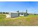 Side view of home at 556 Lowell Nw Ave, Port Charlotte, FL 33952