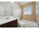Bathroom with bathtub and tiled walls at 556 Lowell Nw Ave, Port Charlotte, FL 33952